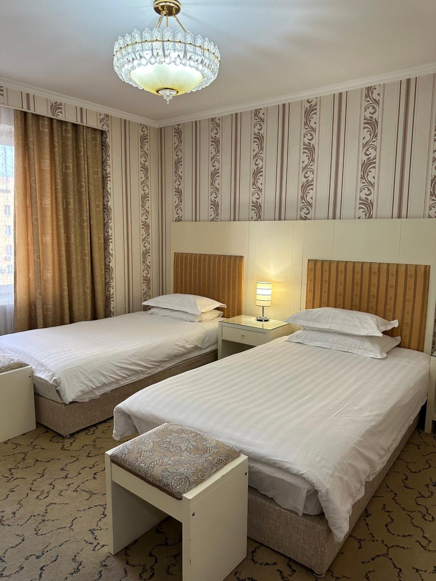 G Empire Hotell Astana Exteriör bild